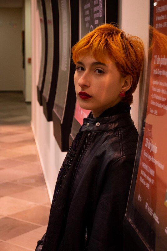 Yasmyn Almeida as Lily in Escória