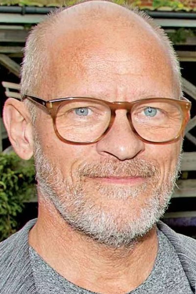 Lars Bom as Christian Torp in Strisser på Samsø