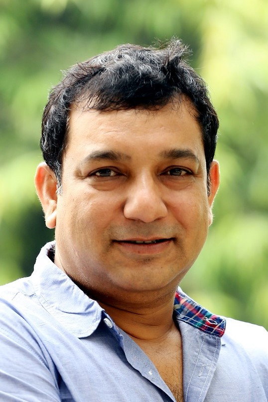 Tauquir Ahmed as Truck Driver #1 in A Fairy Tale
