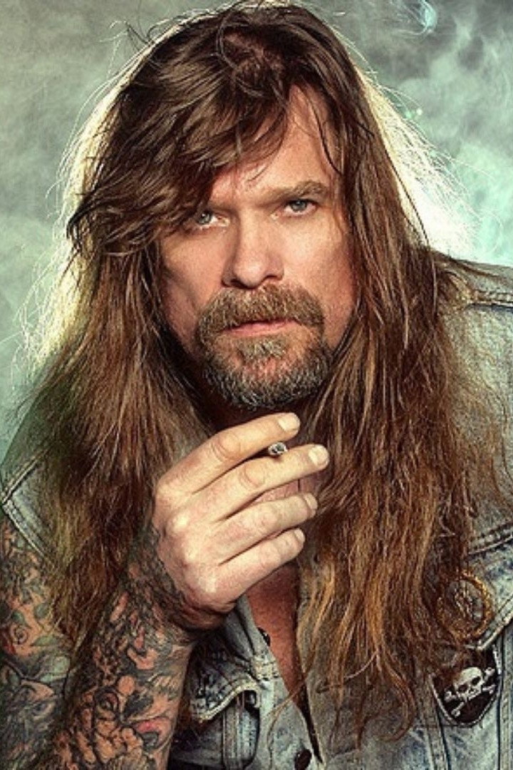 Chris Holmes as W.A.S.P. guitar player (segment "Heavy Metal") in The Dungeonmaster