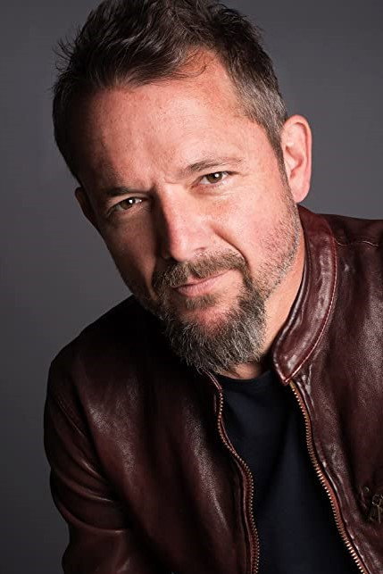 Mike McColl as Ricky Joe in Rumble Through the Dark