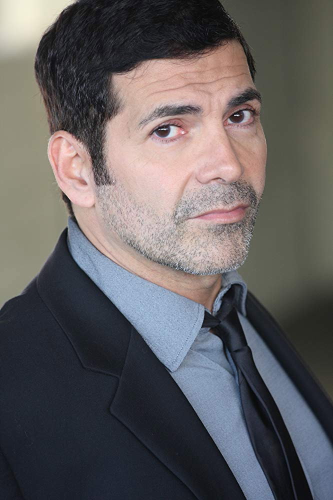 Johnny Ray Rodríguez as 911 Voice in The Thing Inside