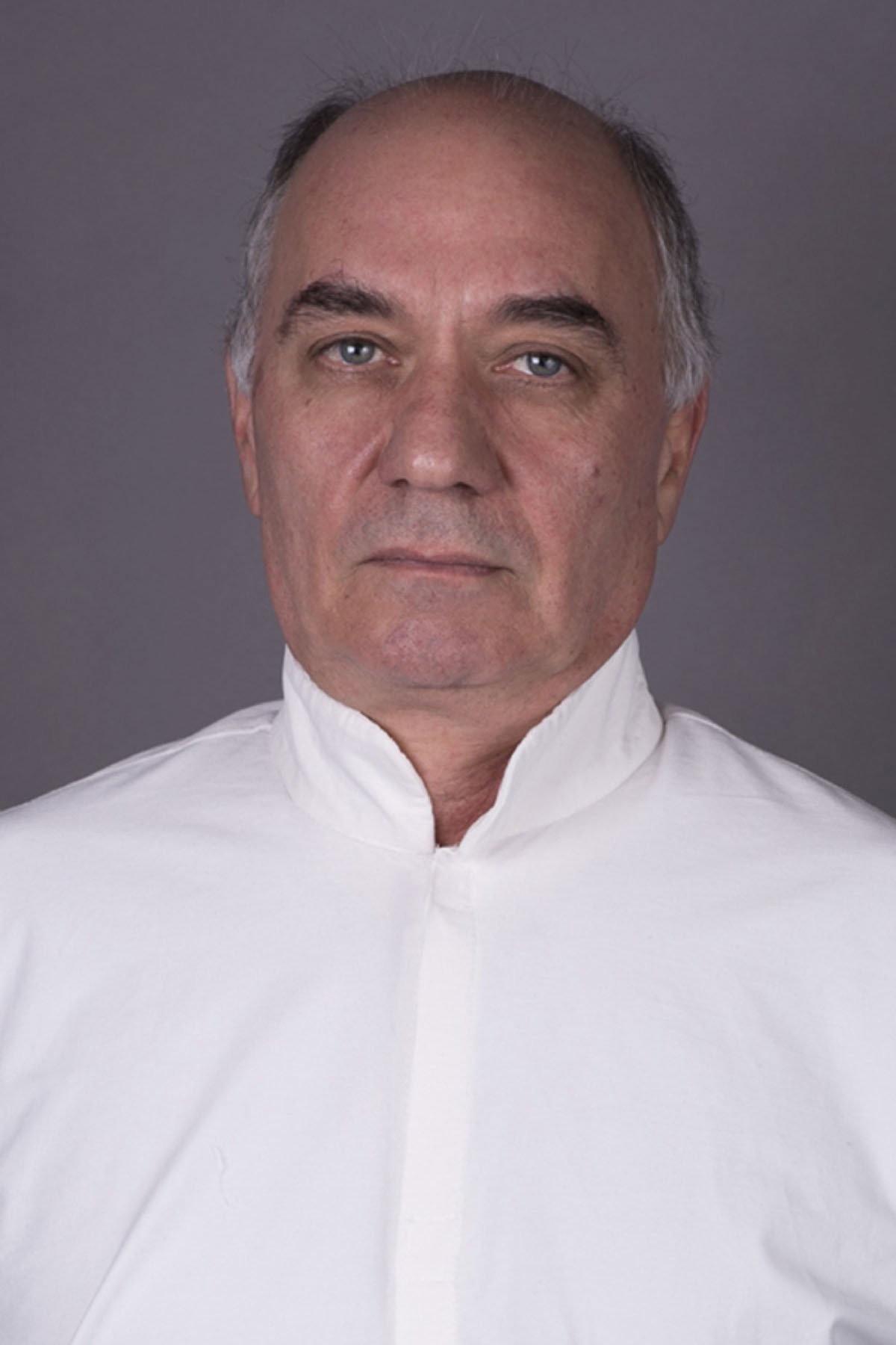 Georgi Kadurin as The Razor in Pistol, Suitcase and Three Stinking Barrels