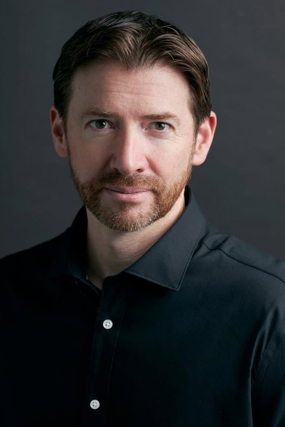 Shiloh Coleman as Father Vernon in Brenda