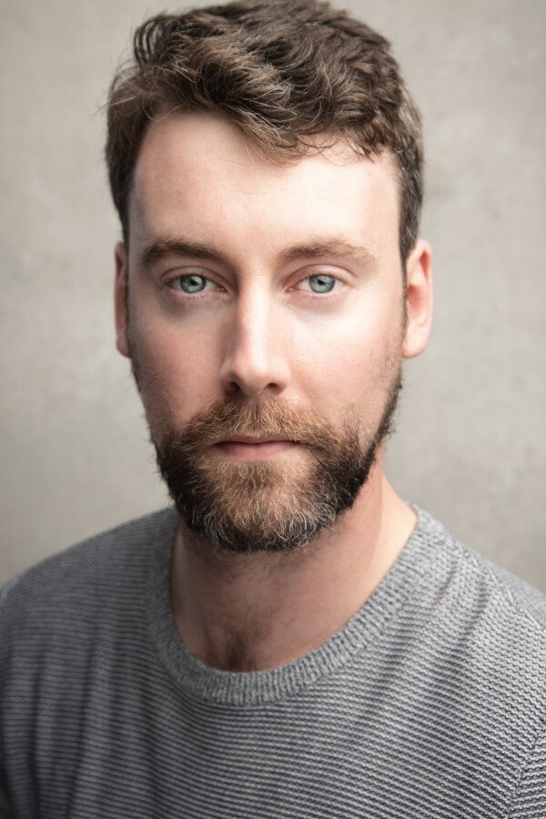 Alan Devally as Malcolm in Missing Buses
