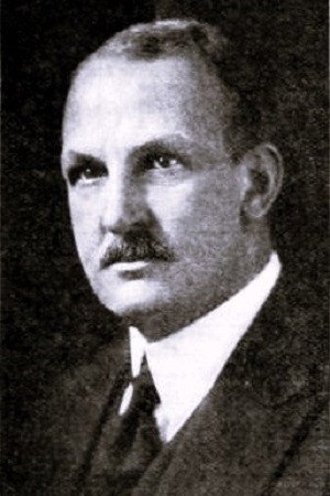Robert Cummings as Col. Dickinson in The Wall Between
