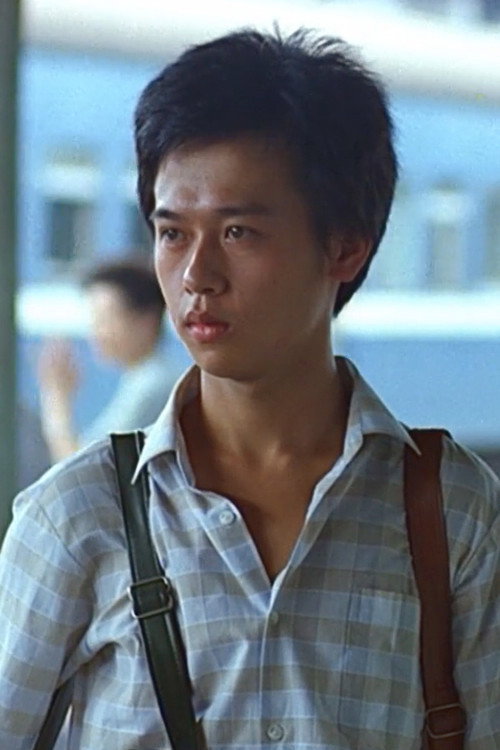 Chien-wen Wang as Wan in Dust in the Wind