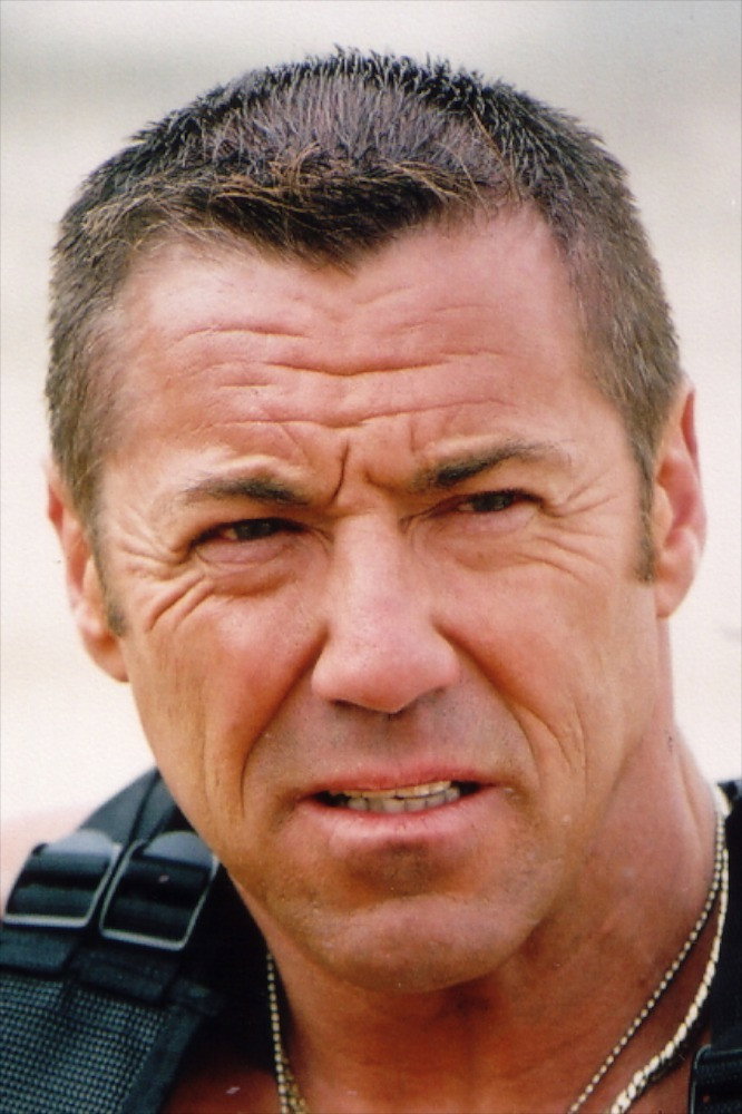 Mike Mitchell as John 'Mad Dog' McKellen in Zombie Massacre