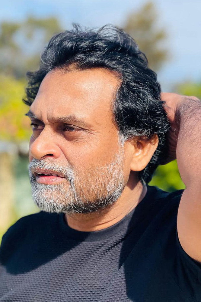 Priyantha Sirikumara as Rajendra in IKKA