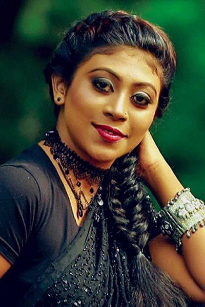 Divya Gopinath as SI Preethi Pothuval in Anjaam Pathiraa