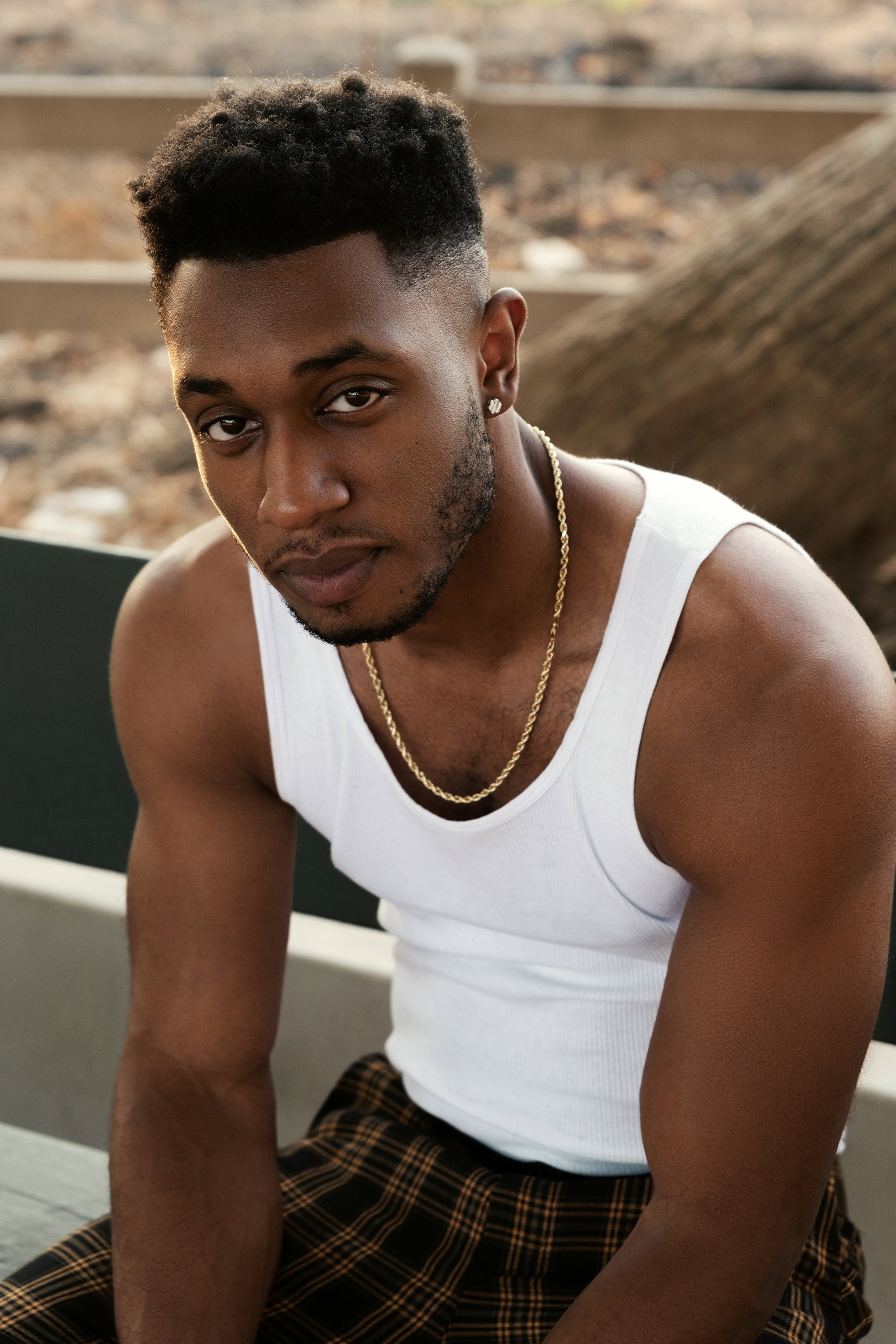 Isaiah Jarel as Curtis in Gook