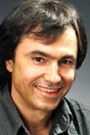 Юрий Коренев as Роман Кожлаев - криминальный авторитет in CU