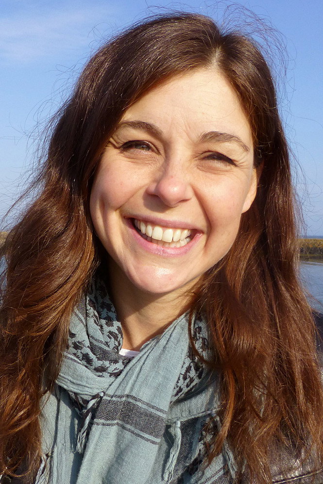 Cassie Newland as Host in Time Crashers