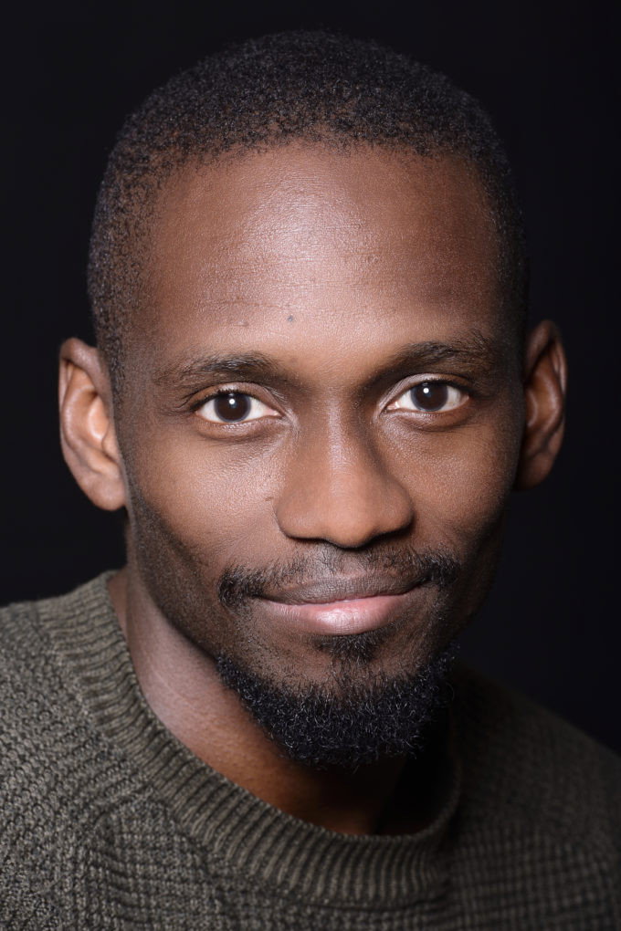 Jermaine Spivey as Postmaster Wieland in Revisor