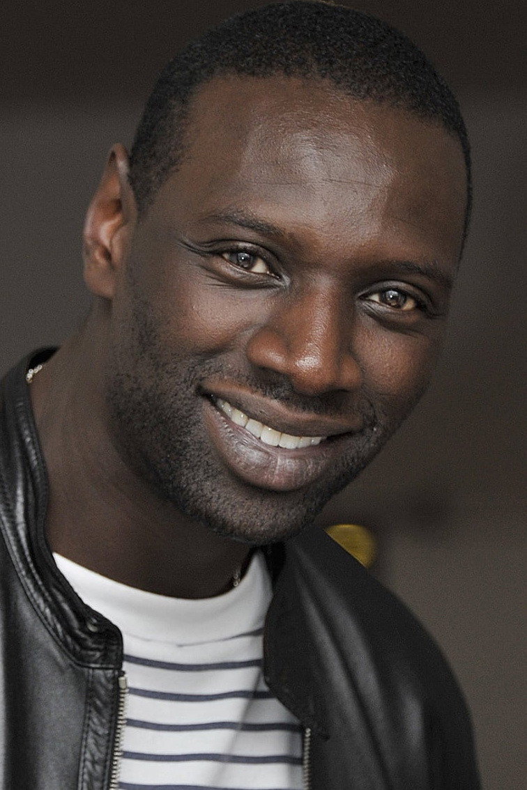 Omar Sy as Sey in The Killer