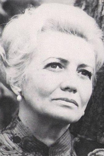 Louise Conte as Étienne's Godmother in Un éléphant ça trompe énormément