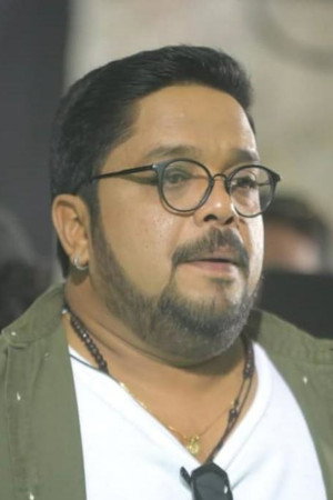 Johny Antony as Koshy in Sthanarthi Sreekuttan