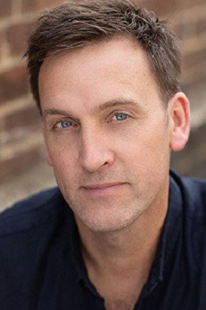 Damien Aylward as Father in Molly