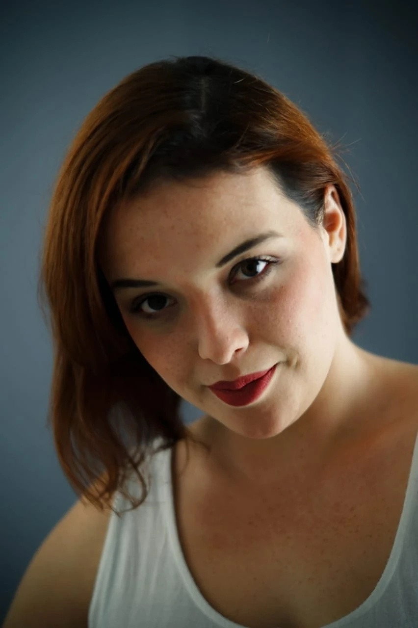 Lourdes Arruti as Emilia (voice) in Villainous
