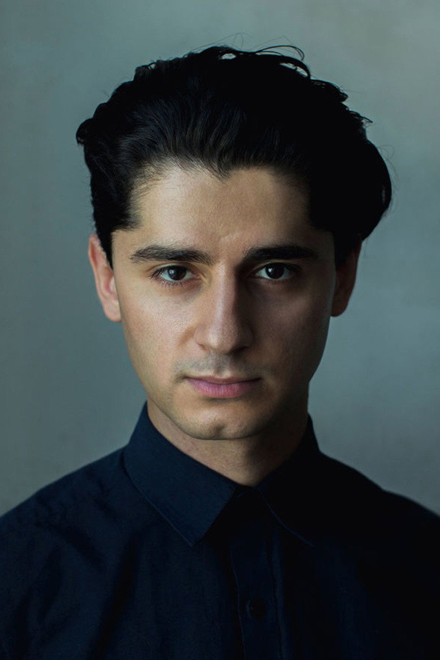 Rauand Taleb as Amin Halba in The Witnesses
