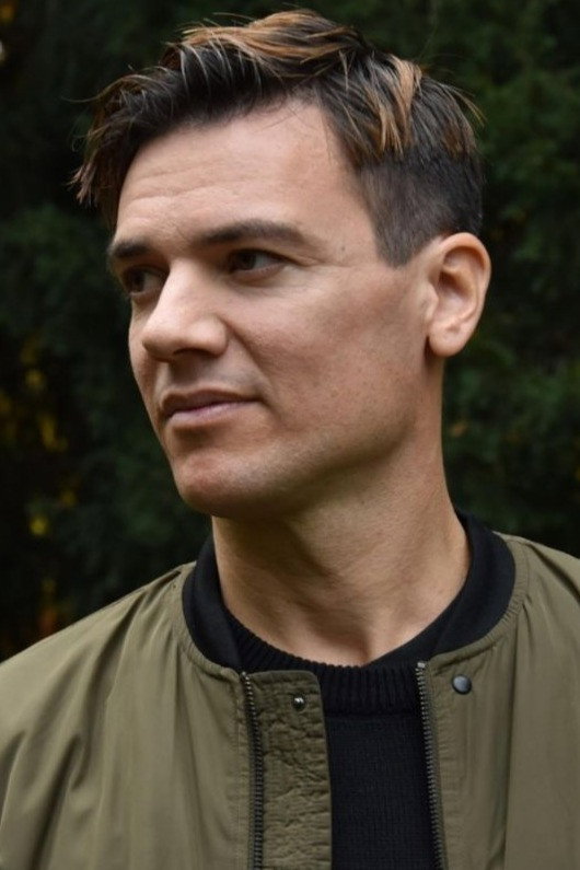 Ivan Brusa as Ettore Cometti in Evil Building