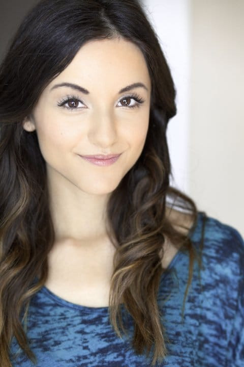 Ren Harris as Emma in Pledges