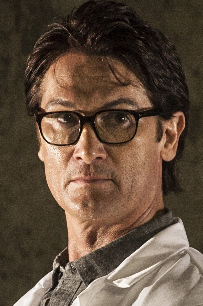 Niko Foster as Det. Chuck Monaghan in Ruthless