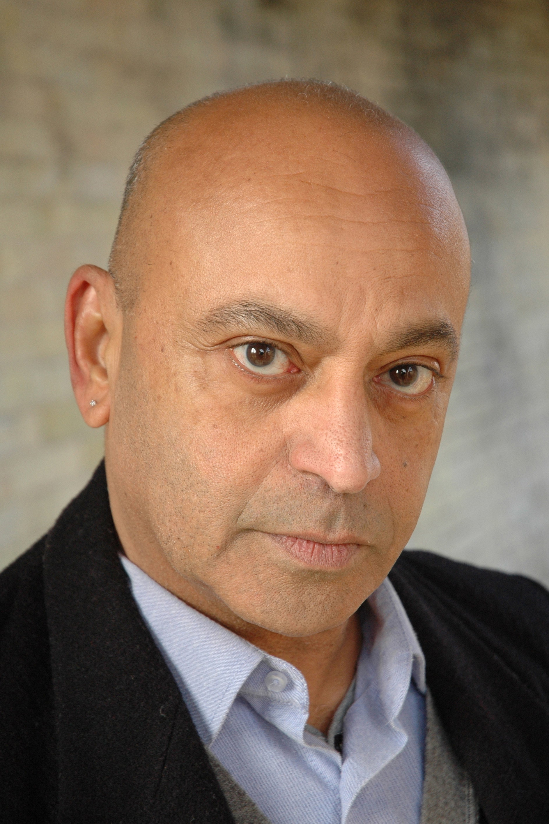 Hassani Shapi as Karim in Pizza and Dates