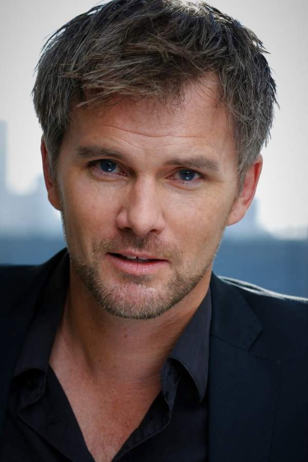 Jamie Irvine as Allan Bishop in Literally Dead