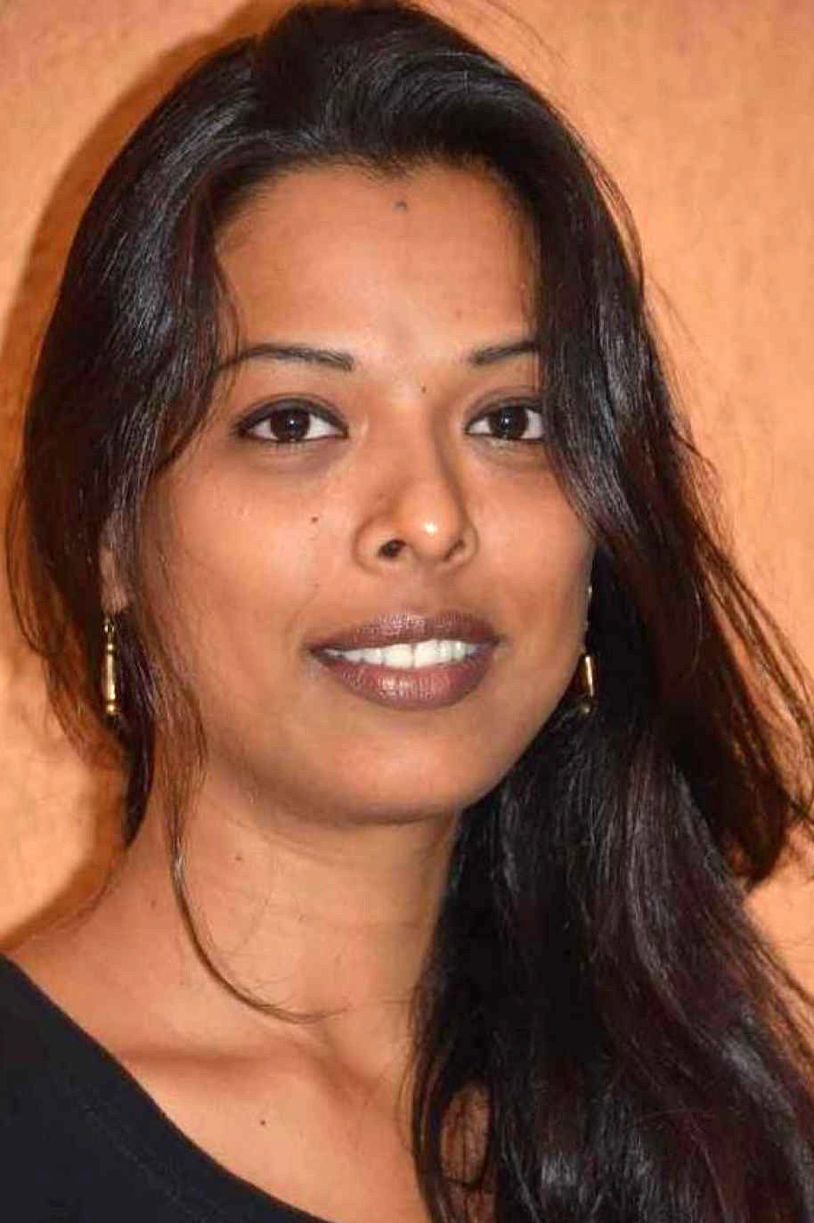 Kiran Khoje as Dhavle's wife in Ajji