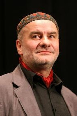 Alfréd Járai as Halics in Satantango