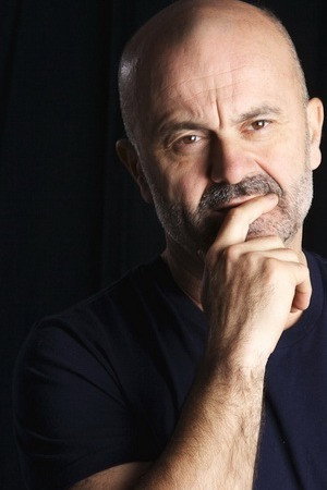 Sergio Pierattini as Padre Lulli in The First on the List