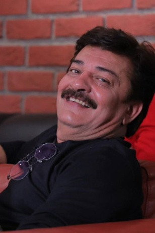 Dharmesh Vyas as Sharad in Jalso: A Family Invitation