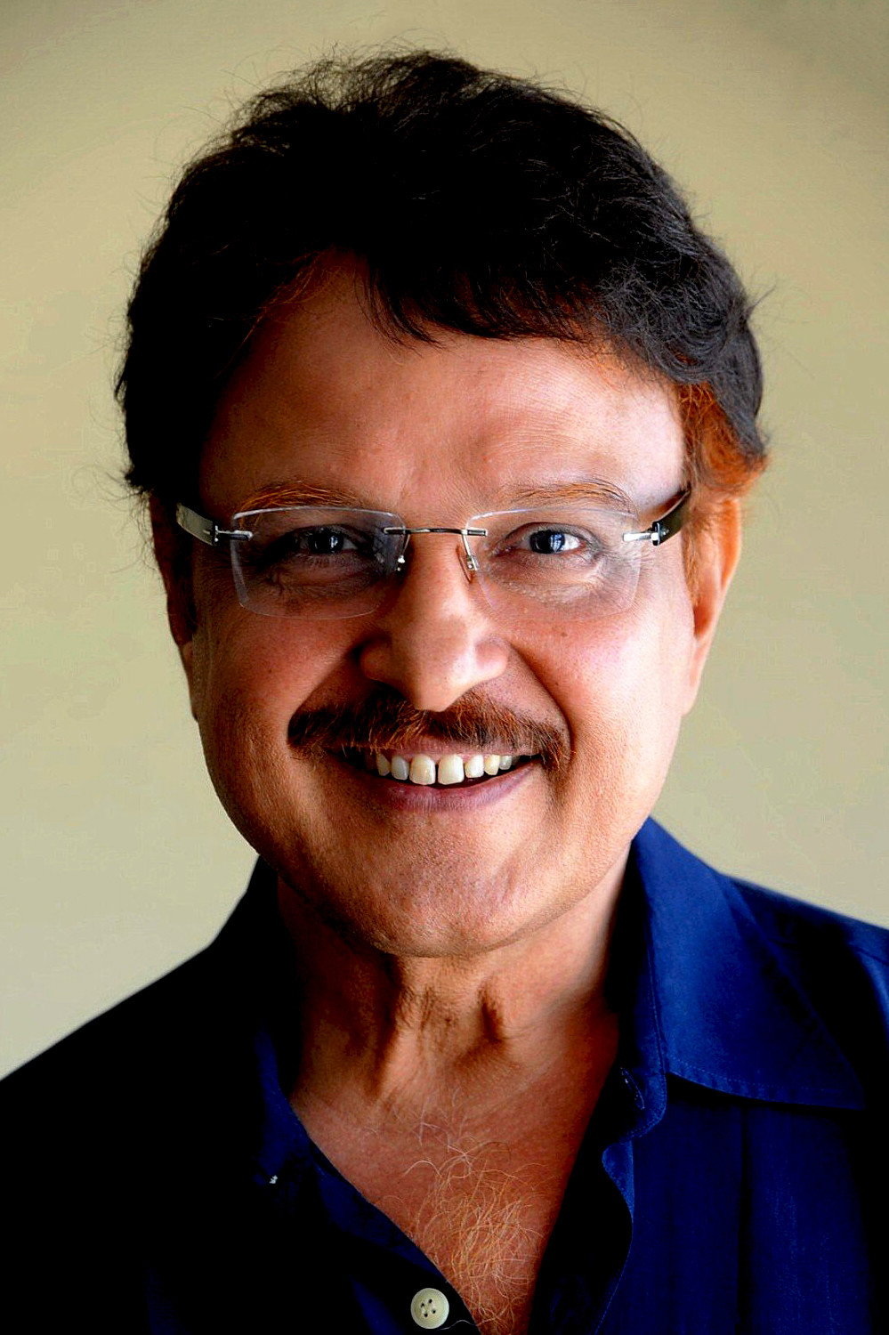 Sarath Babu as Ramasamy in Captain