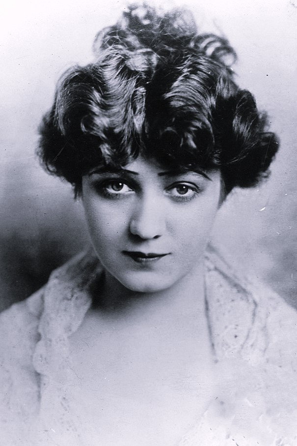 Edna Mayo as Peggy Lorraine in The Greater Courage