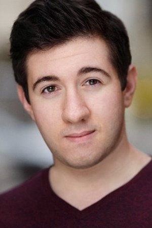 Elliot Lazar as Sergei, Bellboy in Siberia
