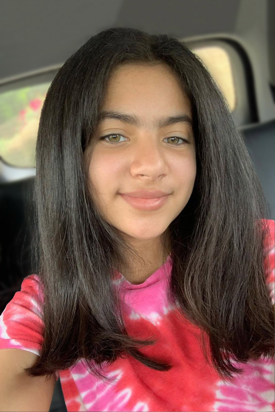 Mia Castillo as Ginny's Babysitter in Fight Like a Mother