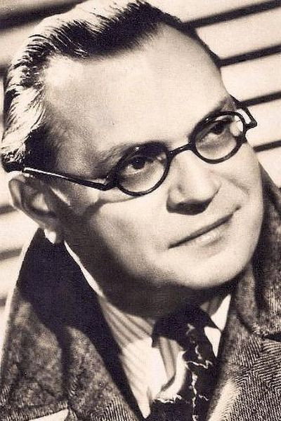 Raymond Souplex as Le docteur Belhomme in Dear Caroline