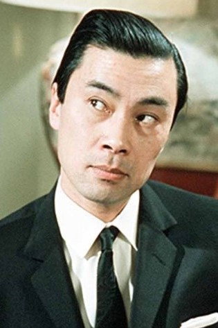 Burt Kwouk as Uncle Taï in Kiss of the Dragon