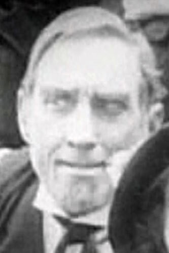 Frank Opperman as Henry Cooper - Traveling Lecturer in A Dash of Courage