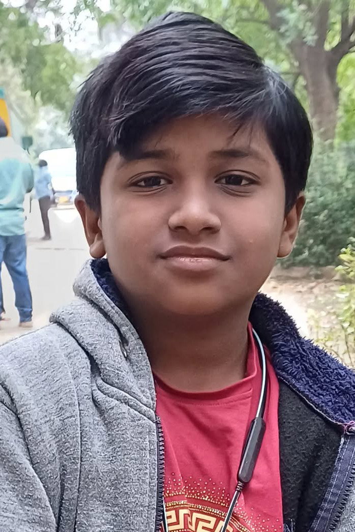 Kamalesh Jegan as Mulli Dharmadas in Tourist Family