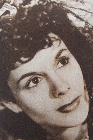 Delia Garcés as Gloria Milalta in Él