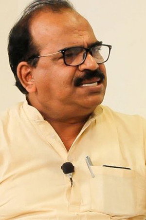 Nanjil Sampath as Azhagu Meiyappan in LKG