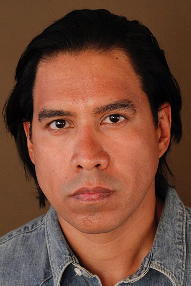 Julian Garcia as Man on Couch in Nightstalker