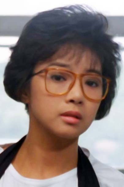 吳寧 as Mimi Li in Tiger on the Beat