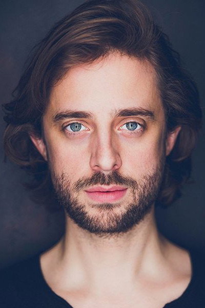 Sebastian Beacon as Greg in Royally