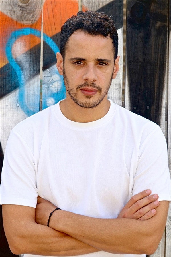 Adel Djemai as TJ in Douze Points