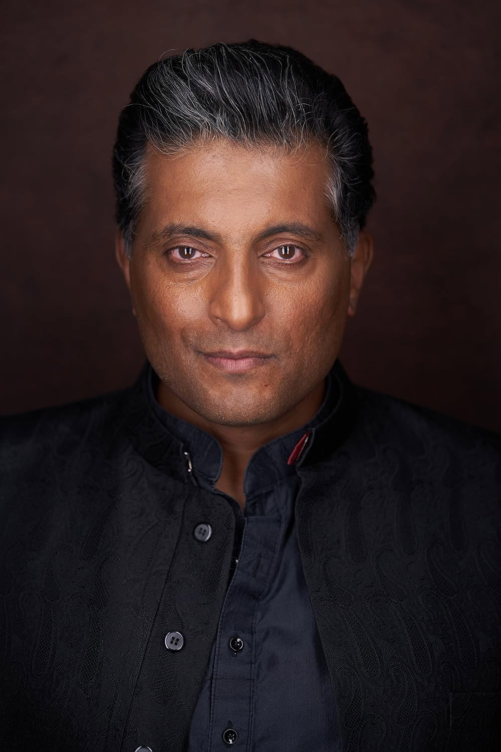 Rupinder Nagra as Harvinder ("Happy") in Bring It All Back Home