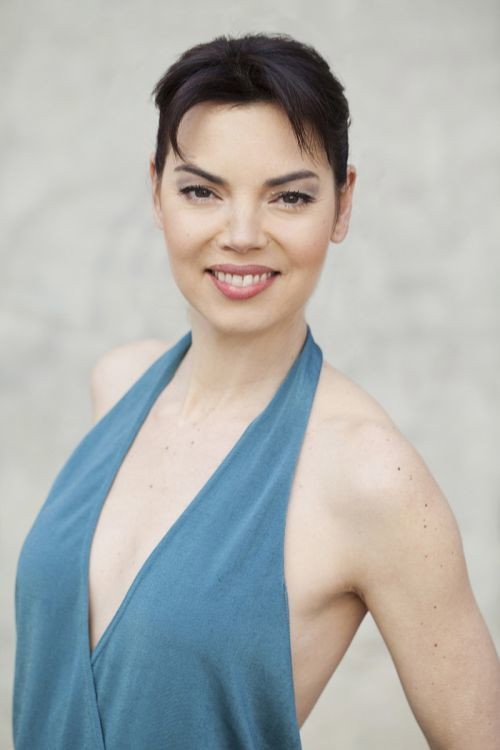 Liliana Cabal as Officer Wilson in Alien Invasion