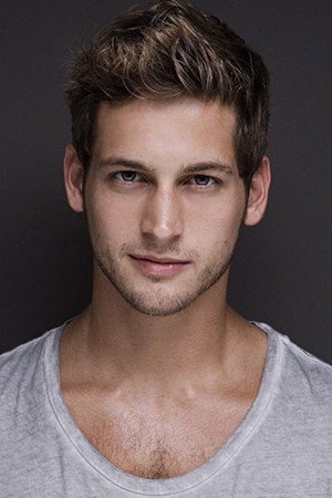 Max Emerson as Mitchell in Writing Around the Christmas Tree